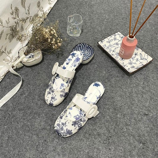 Premium floral-print mules Material Linen with oval-buckle straps complement